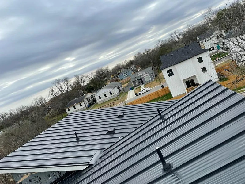 Standing seam metal roof panels with vents for Skylight Repair in Jefferson